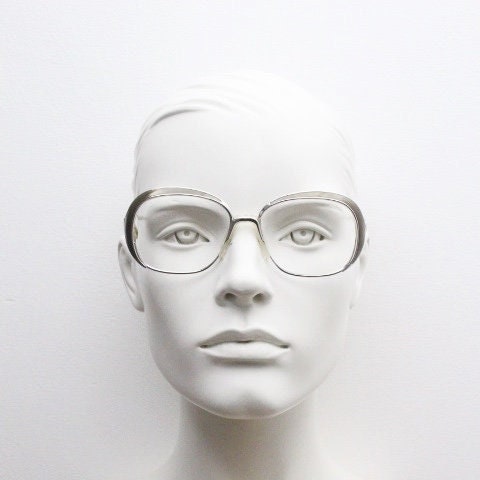 Christian Dior 70s vintage big round eye glasses made in Austria. Silver optical frame with dynamic reflective grey enamel. Prescription RX