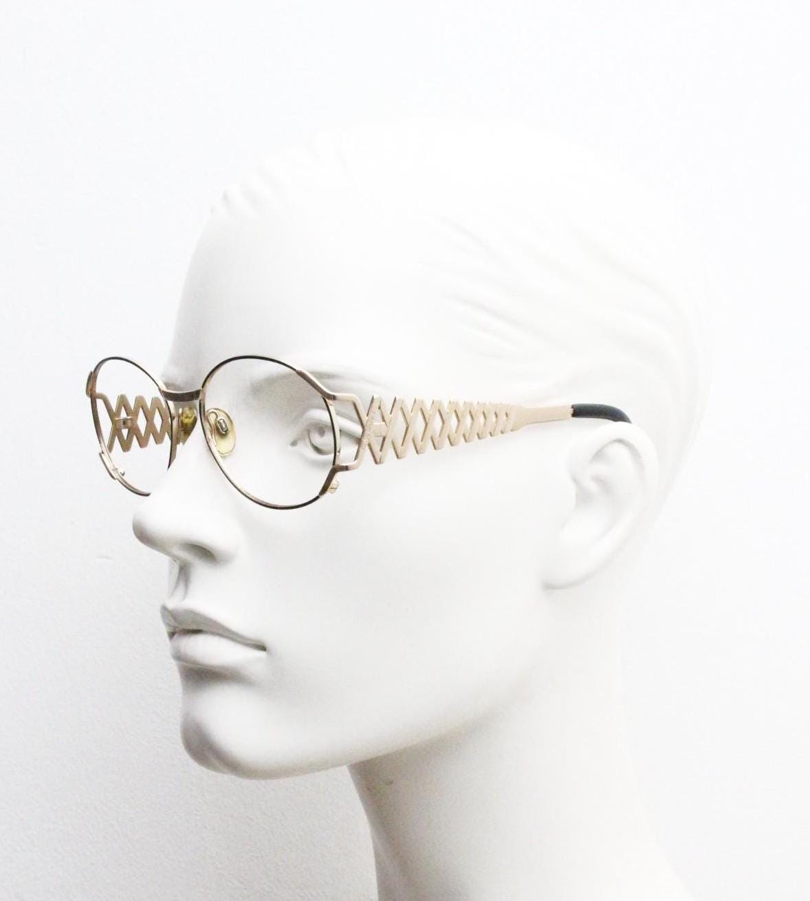 Yves Saint laurent 90s vintage large oval eye glasses made in Italy with incredible zig zag arm design. YSL Prescription RX spectacles