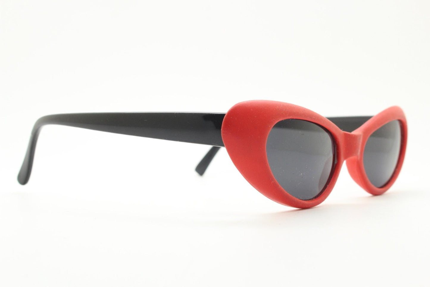 Vintage 80s oval cat eye sunglasses. Dynamic red rubber front with black gloss arms. Hyper real cosplay cateye. New wave punk