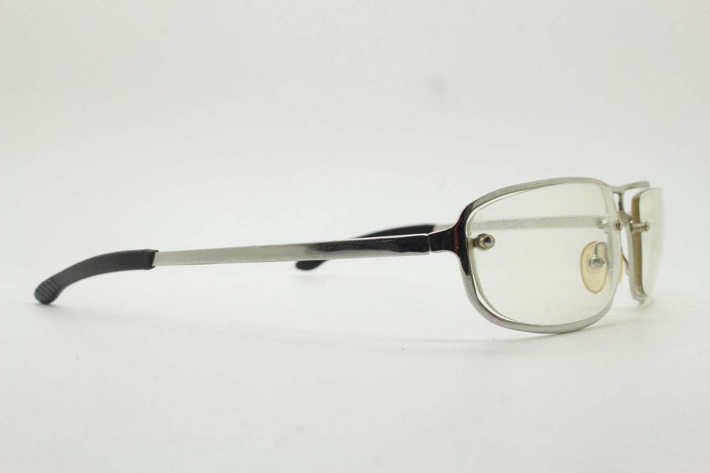 Y2K vintage rectangular aviator sunglasses. Aerodynamic racing style chrome frame with slight mirror glazed clear lens. 2000's bug eye