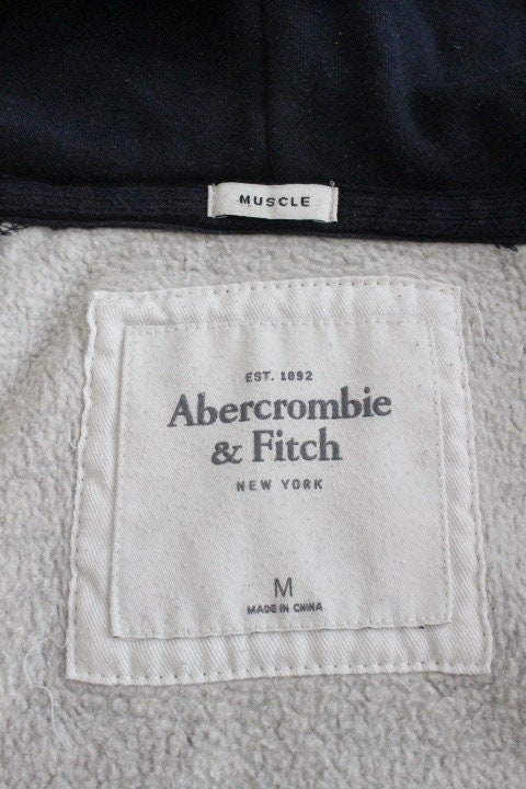 Abercrombie and Fitch grey and blue zipper sweat hoody with large red spell out patch letter chest logo. Mens all cotton medium size