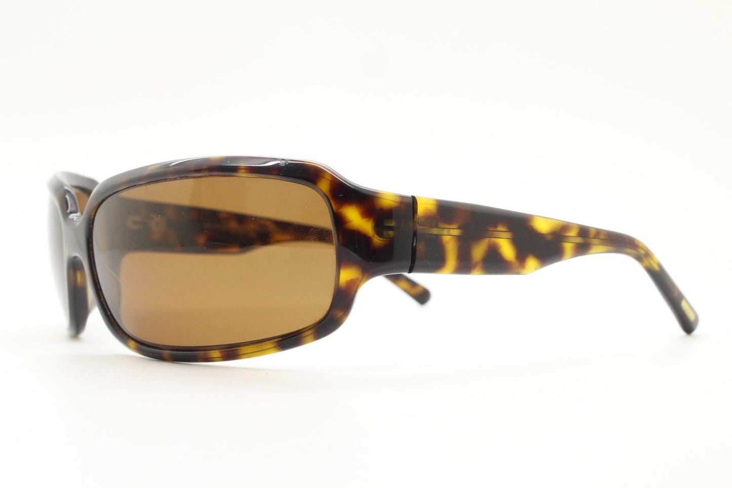 Oliver Peoples vintage Y2K wrap around sunglasses model Impala made in Japan. Curved bug eye in mottled brown tortoise acetate