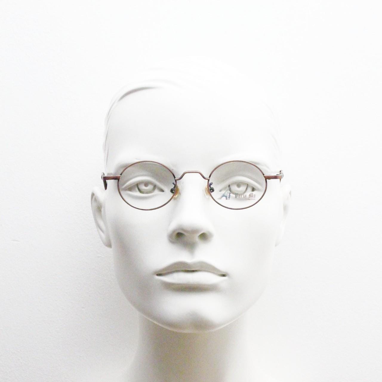 Paris Ma 90s vintage small oval eye glasses. Brushed bronze optical frames with scrolled arm details. Prescription. Steampunk spectacles NOS