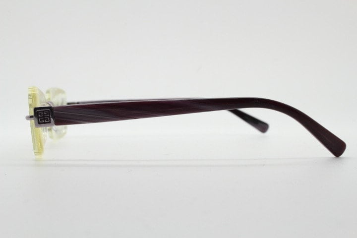 Givenchy rectangular frameless eye glasses made in Italy. Minimal optical frame with marbled brown arms. Prescription RX spectacles. Vintage