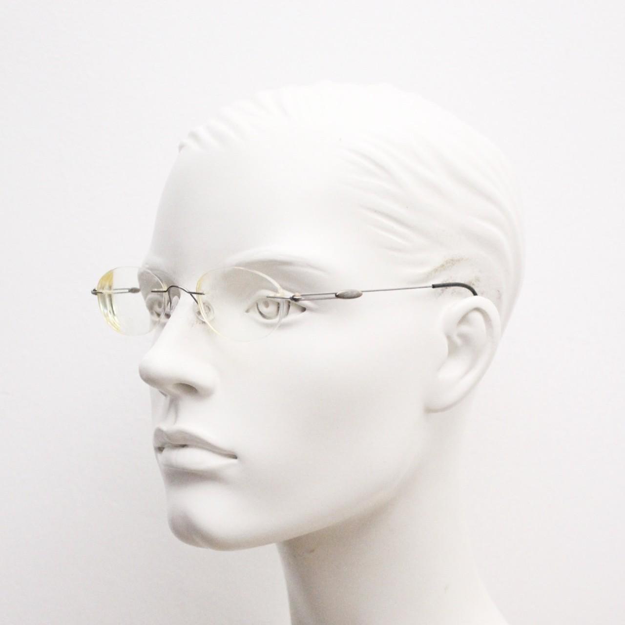 Silhouette vintage oval frameless eye glasses made in Austria. Minimal lightweight brown chrome optical frame. Prescription spectacles