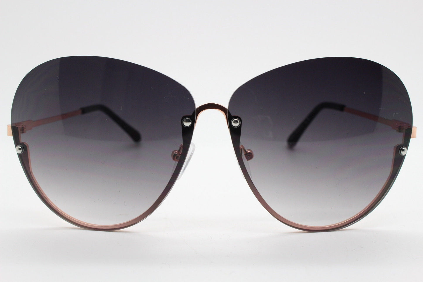 Y2K vintage large rimless sunglasses. Women's 70s style half frame design with graduating black lenses and gold arms. 2000s BNWT