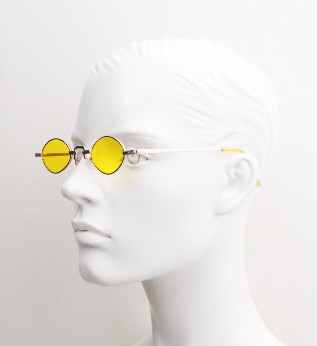 90s vintage small oval sunglasses. Imposing minimal rose gold metal victorian style frame with yellow lenses. Steampunk. BNWT