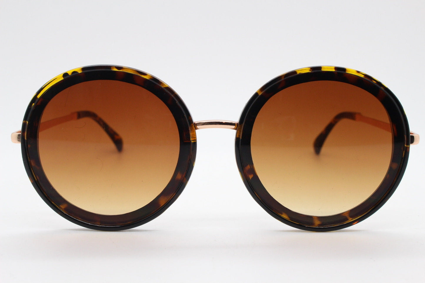Y2k vintage round sunglasses. Women's tortoise frame with contrasting gold arms and brown flat sultry graduating lenses. Unused BNWT