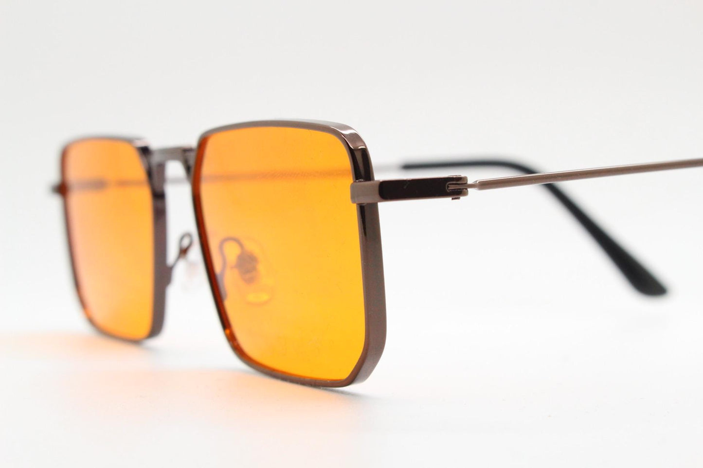 90s vintage angular 6 sided sunglasses. Brown chrome metal frame with blazing flat orange lenses. Rectangular psychedelic sunnies. BNWT
