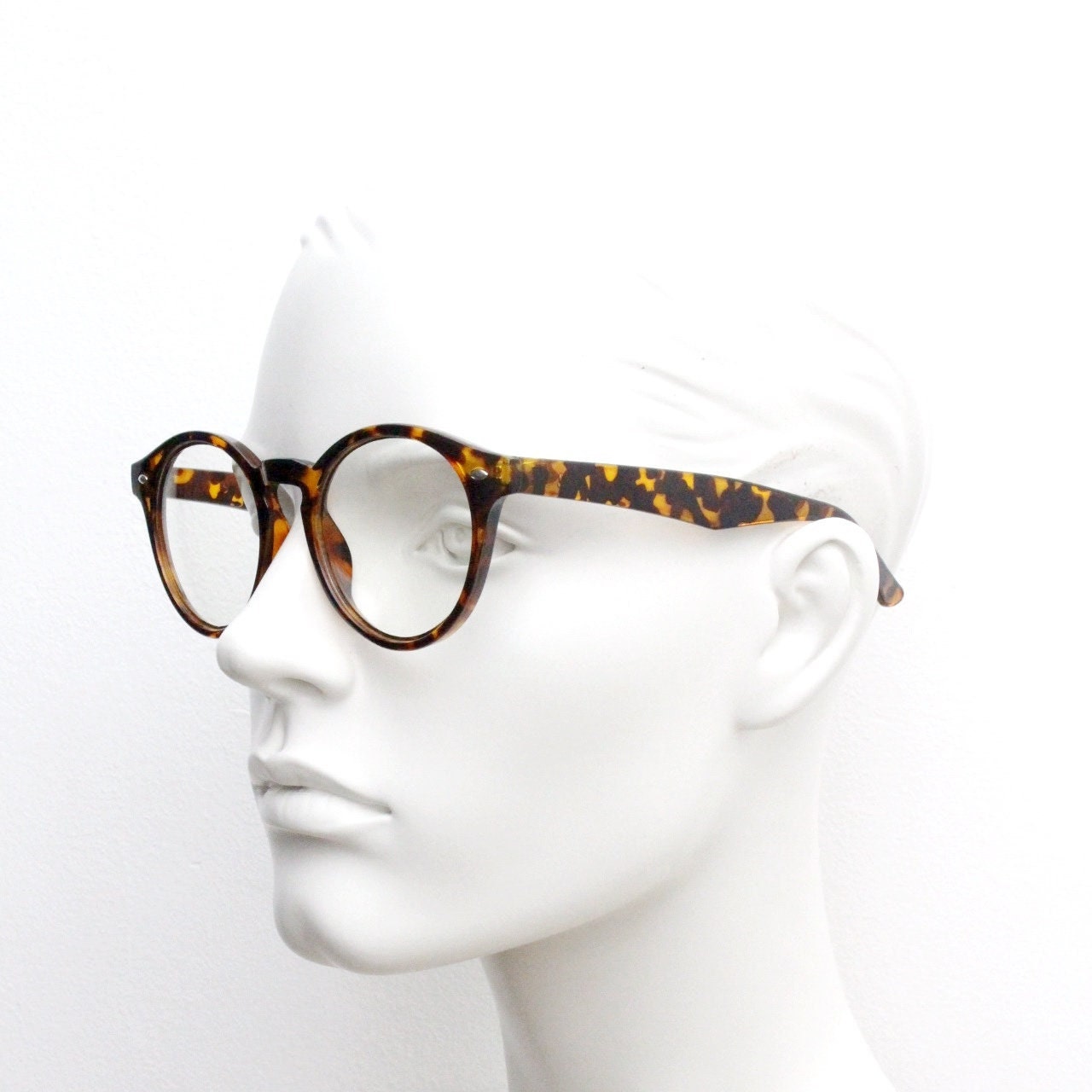 90s vintage round eye glasses. Tortoise gloss 40s design optical frame with keyhole bridge and clear lenses. Prescription RX Spectacles