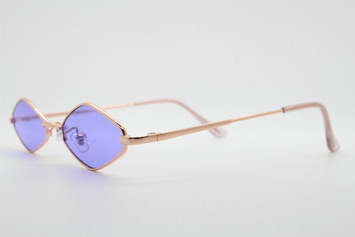 90s vintage small diamond sunglasses. Minimal gold psychedelic mod style frame with bright purple lenses. Unused New Old Stock