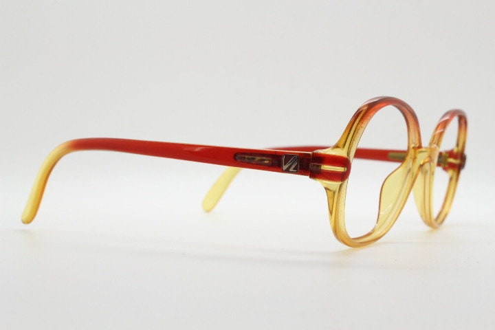 Viennaline 70s vintage round eye glasses made from Optyl. Red to yellow ombre fade optical frames. Womens NOS prescription RX eyeglasses