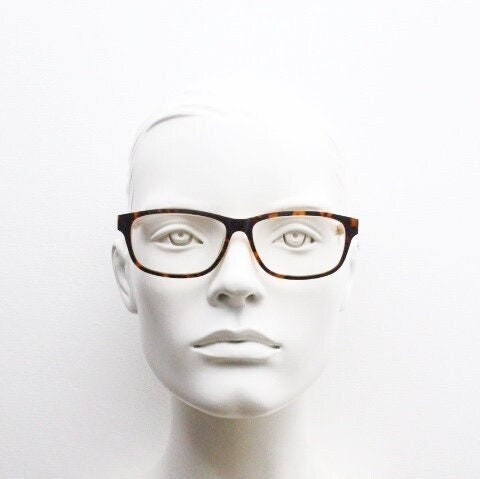 Cheap Monday rectangular low profile eye glasses. Brown and amber layered acetate optical frames. Prescription eyeglasses. RX spectacles
