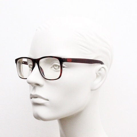 Versace modified wayfarer design eye glasses made in Italy. Mottled brown acetate optical frames with subtle logo. Prescription eyeglasses