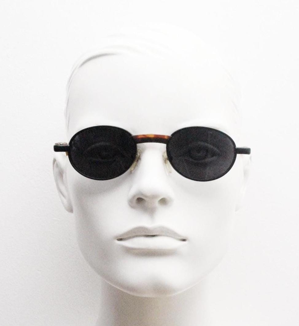 90s oval vintage metal sunglasses. Classic 1990s features of minimal satin finish solid frame with matt tortoise arms. Steampunk. Unused NOS
