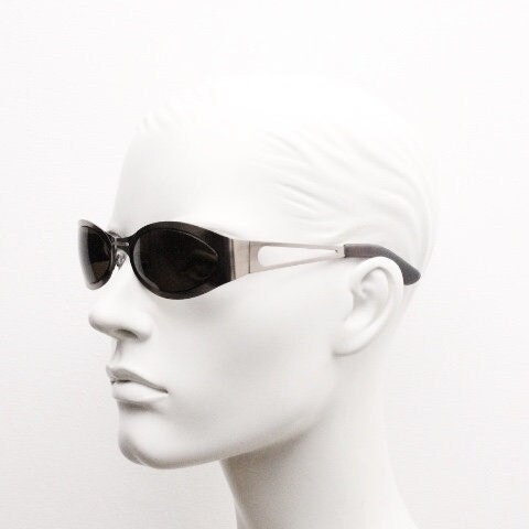 2000s vintage wraparound angular sunglasses. Brown chrome flat curved metal frame with cut out arms. 90s. Y2K unused NOS