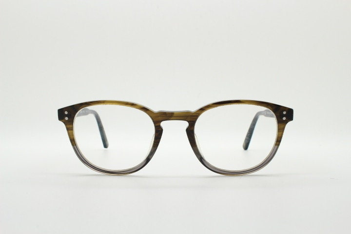 Land Rover vintage round 40s design eye glasses.Mottled brown and grey acetate optical frame with keyhole bridge. Prescription RX