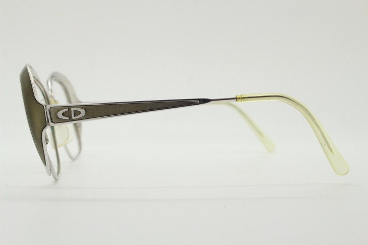 Christian Dior 70s vintage big round eye glasses made in Austria. Silver optical frame with dynamic reflective grey enamel. Prescription RX
