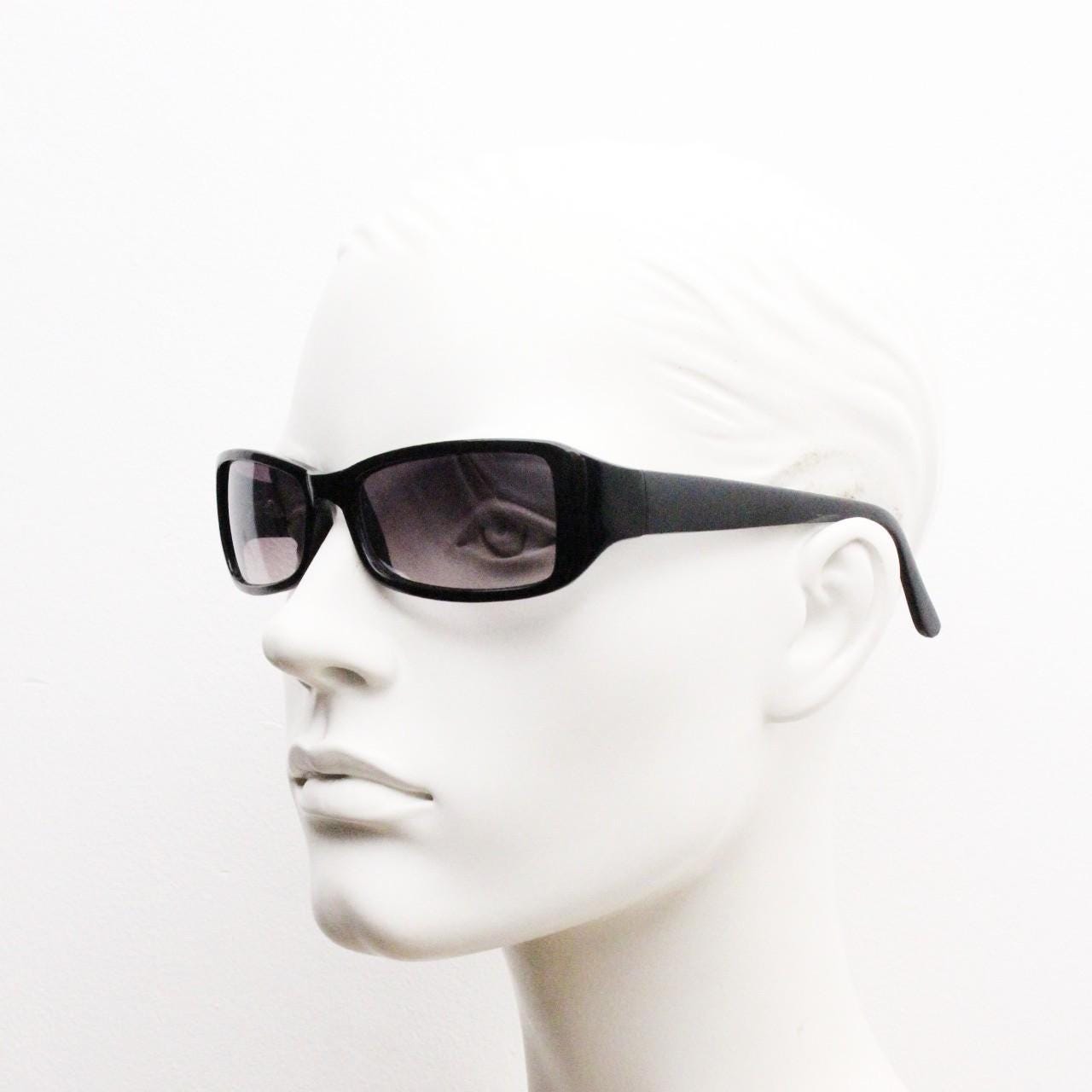 90s vintage rectangular curved wraparound sunglasses. Womens aerodynamic quality black acetate cat eye frame. Minimal shield design. NOS