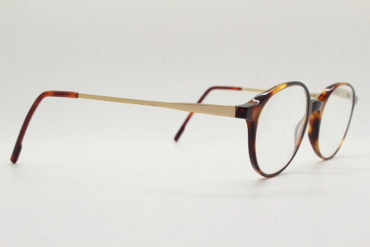 Moleskine round eye glasses in tortoise acetate with slim golden arms. Reading optical frames. Prescription eyeglasses. RX spectacles