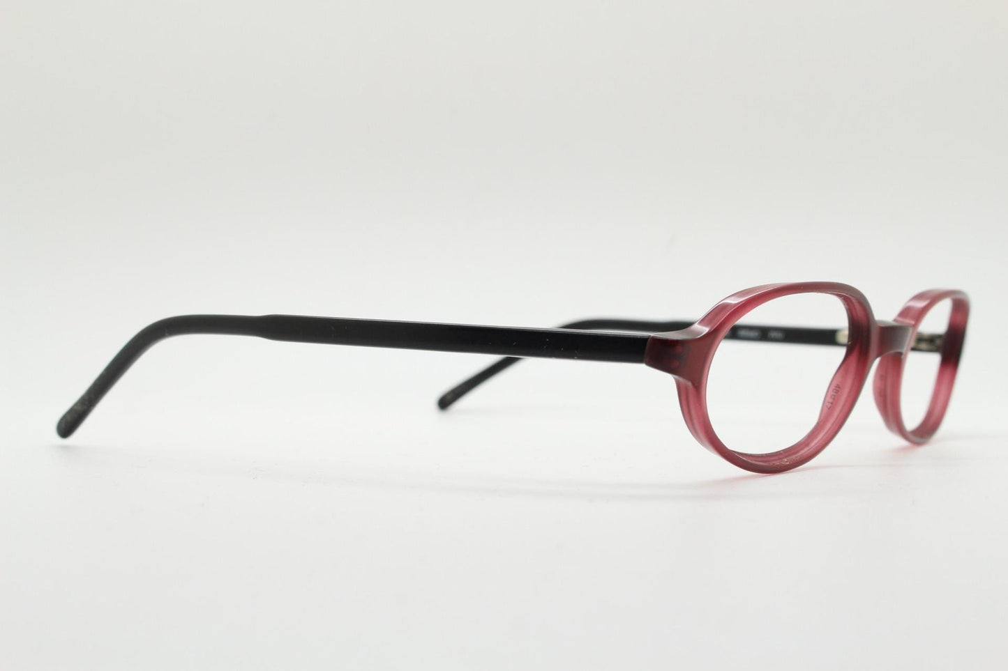 Diesel small oval eye glasses. Transparent brown front with black gloss arms. Acetate optical frames. Prescription 90s Vintage RX Spectacles