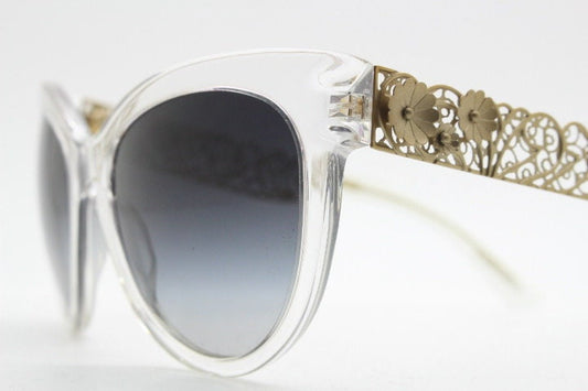 Dolce and Gabbana oversized cateye sunglasses model 4211. Womens transparent cat eye with cut-out florid metal arms and smoky lenses. NOS