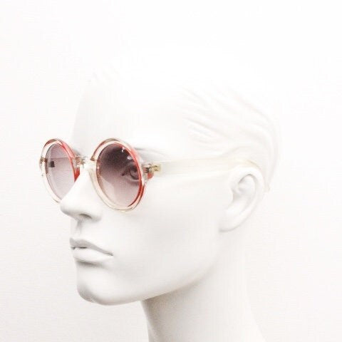 Mary Quant 60s vintage round sunglasses made in France. Yellow crystal transparent lucite frame in with contrasting dark graduating lenses