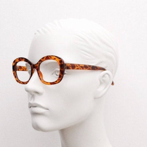 90s vintage angular rounded eye glasses. Transparent vibrant amber giraffe pattern optical frame. Womens prescription eyeglasses. RX