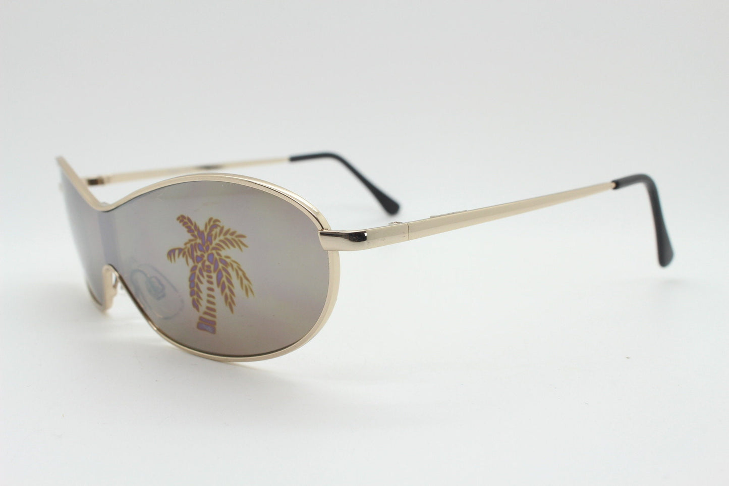 Party monster Y2K vintage visor sunglasses. Wraparound mono lens mini mask shield design with mind bending palm tree print. Unused NOS
