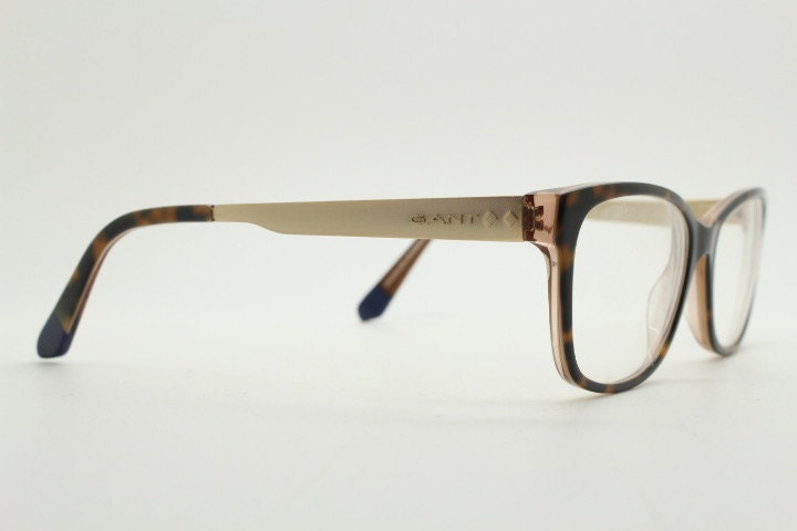 Gant vintage modified cat eye glasses model 4060. Tortoise acetate and satin metal arm cateye optical frames. Womens prescription spectacles