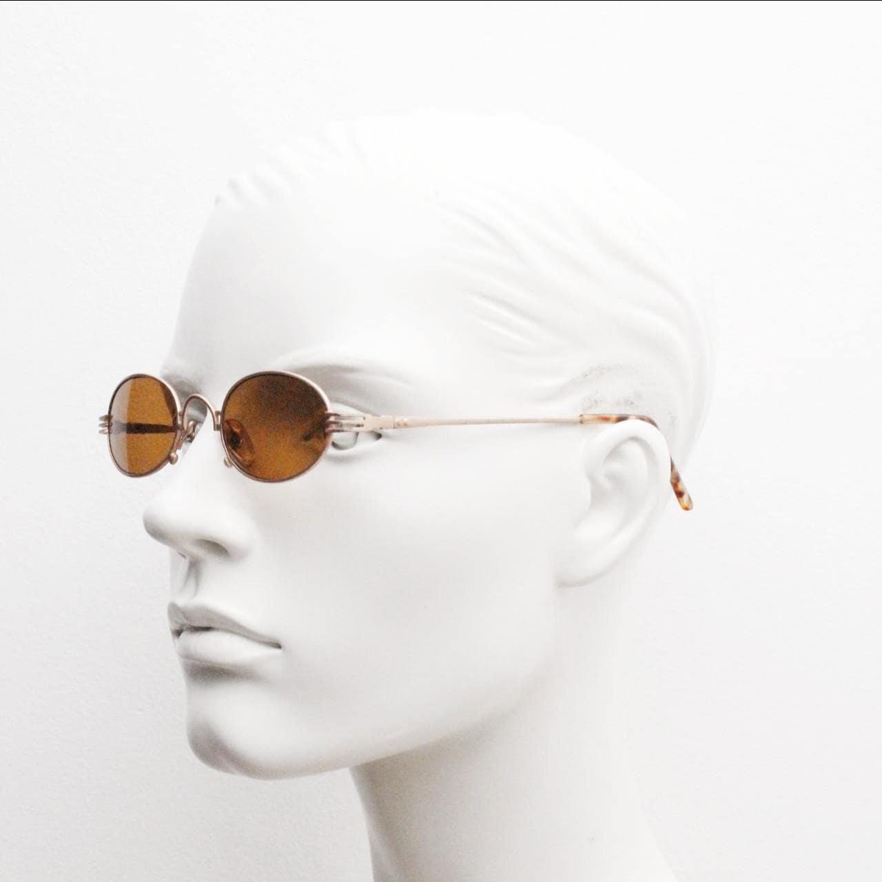90s oval vintage metal sunglasses. Minimal small satin finish gold metal micro frame with brown lenses. Steampunk. Unused NOS