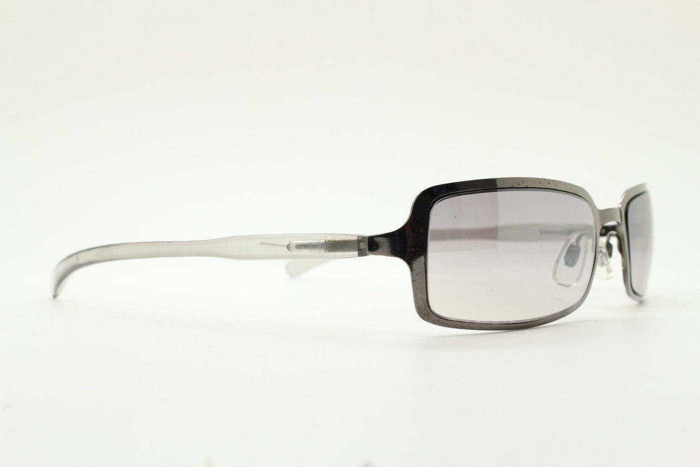 Y2K vintage rectangular sunglasses. Low profile mini shield frame in gunmetal chrome with light tone graduated mirror lens. 2000's. 90s. NOS