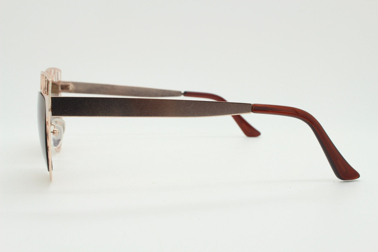 Y2K vintage metal cat eye sunglasses. Women's extraordinary gold cut out lattice scaffold cateye frame with brown lenses. 2000s. BNWT
