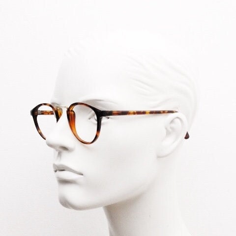 90s vintage round eye glasses. Minimal slim tortoise optical frames with gold bridge. 40s, 50s design prescription eyeglasses. RX spectacles