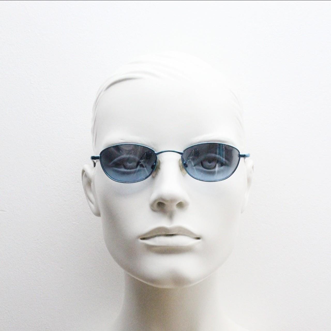 90s vintage small oval sunglasses by X-line. Unusual blue chrome metal frame with well matched mirror lenses. Quality NOS
