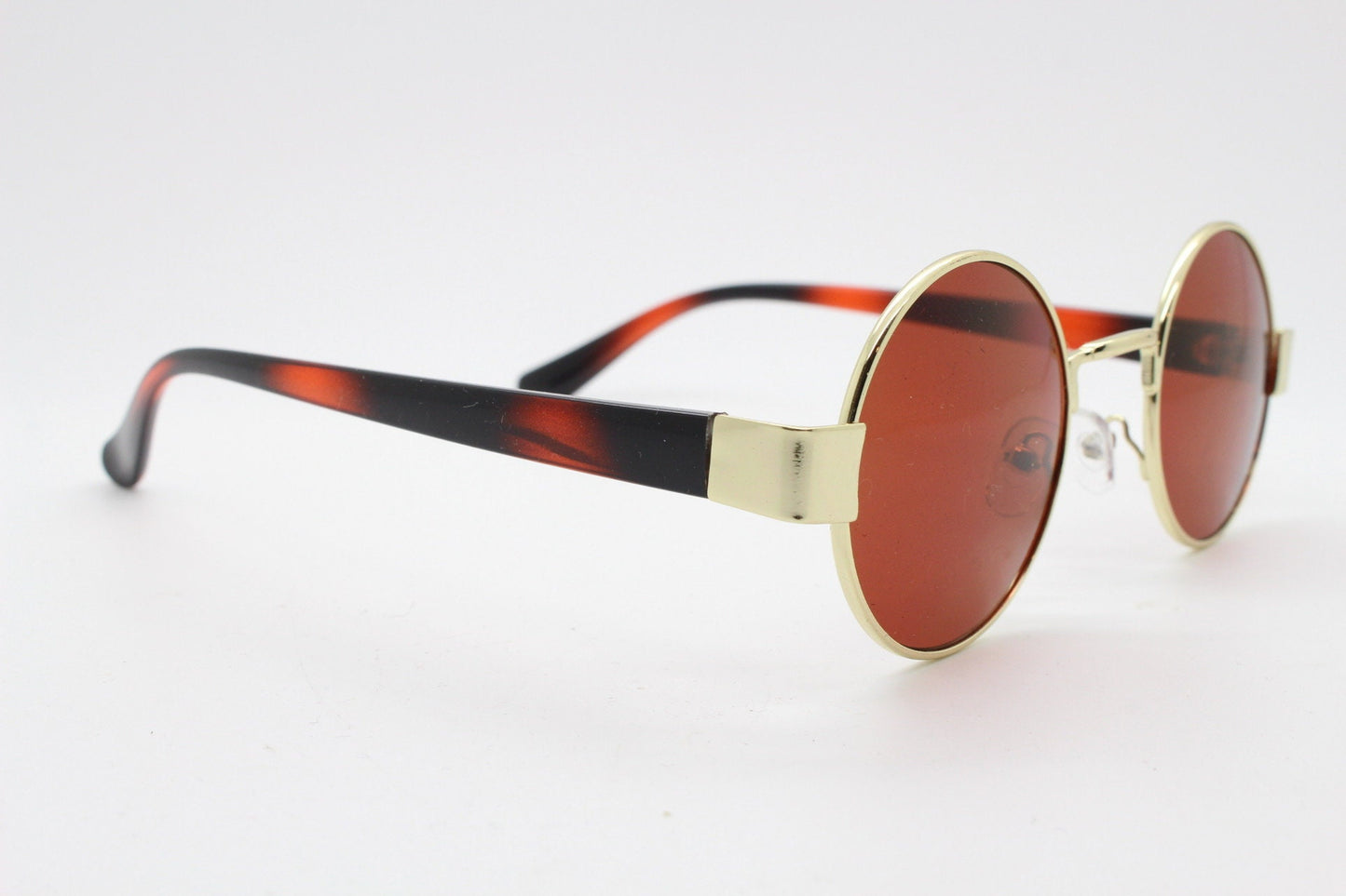 90s round vintage sunglasses. Gold 1920's style frame with tiger pattern arms and brown lenses. Unused. BNWT
