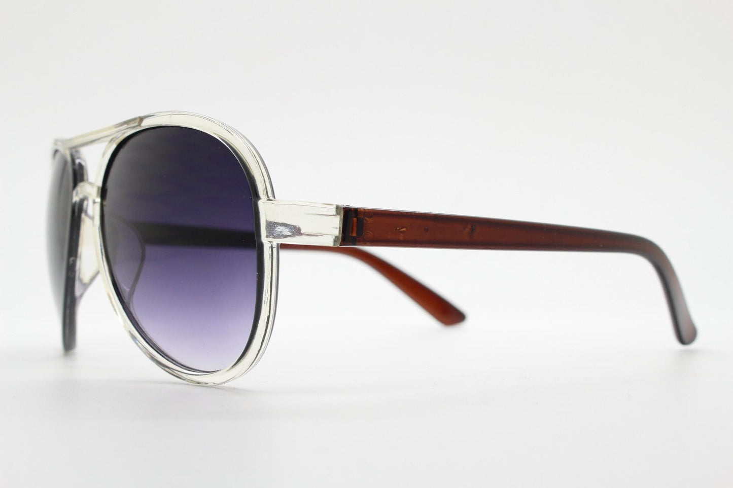 Y2K vintage aviator sunglasses. 2000's transparent and brown frame with with black graduating lenses. 70s design 00's NOS aviators.
