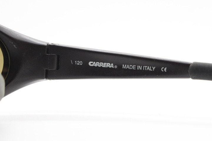 Carrera 90s vintage shield sunglasses made in Italy. Aerodynamic brown wrap around sport frame with big spell out logo. Bug eye. BNWT. NOS