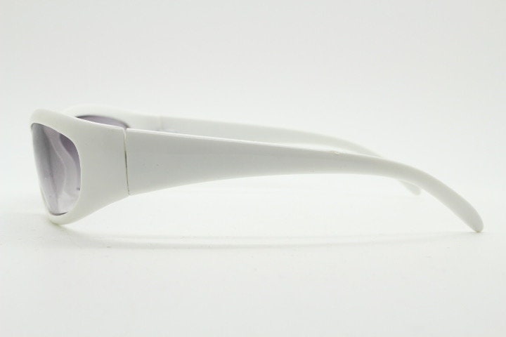 Y2k vintage wrap around bug eye sunglasses. Curving ice white shield frame with light tone lenses. Rave. Super hero cosplay 2000s NOS