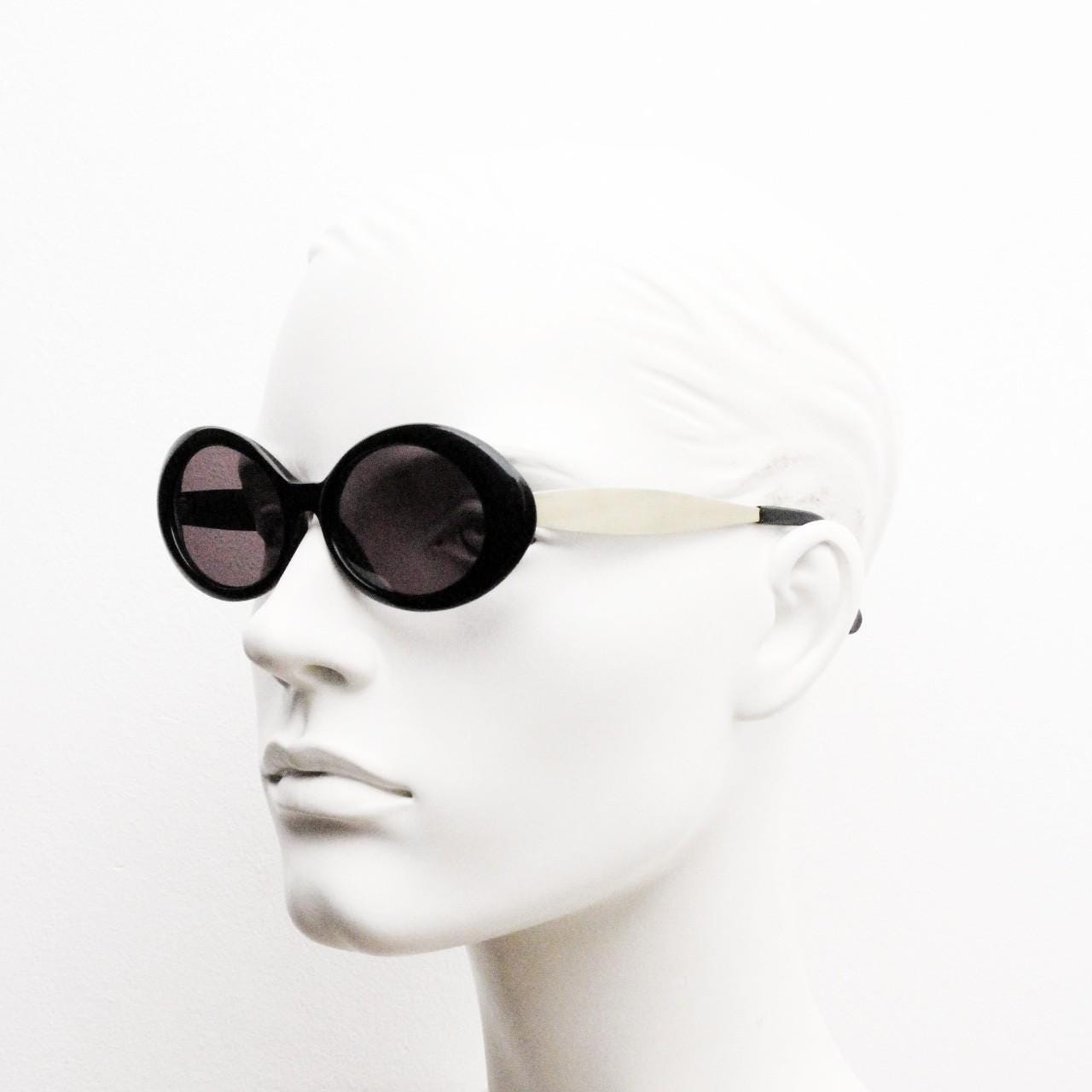 Benson and Ashley vintage 90s oval sunglasses model 406. Neat size quality 60s style acetate frame with tall flat gold arms. New Old Stock.