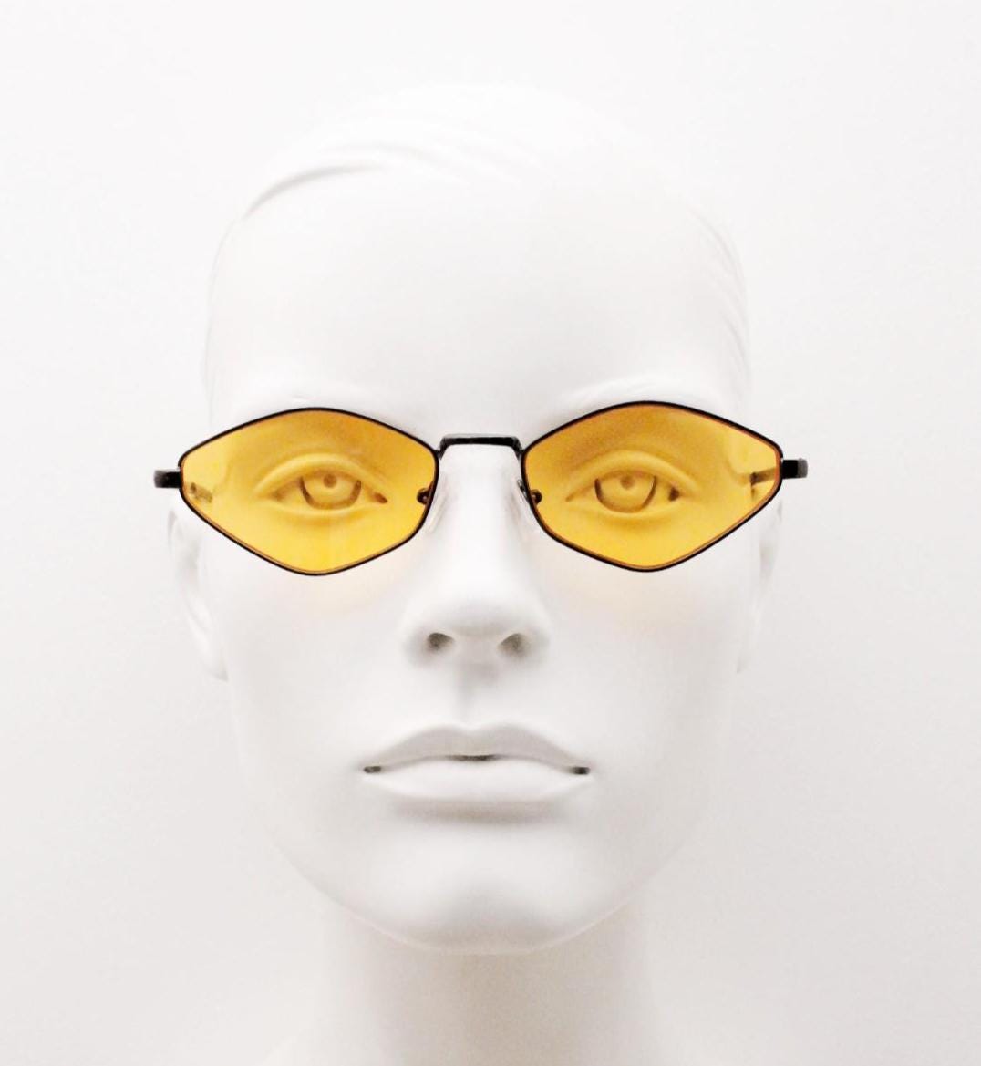 90s vintage pointed hexagon sunglasses. Minimal bronze brown psychedelic mod style frame with blazing orange lenses. Unused NOS