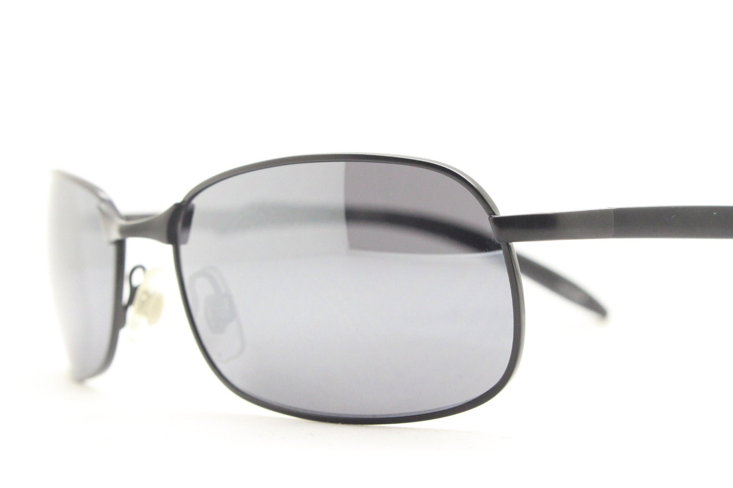 Y2K vintage wraparound sunglasses. Black satin matt finish on rectangular frame with slight mirror glaze lenses. 2000's. 90s. Unused NOS