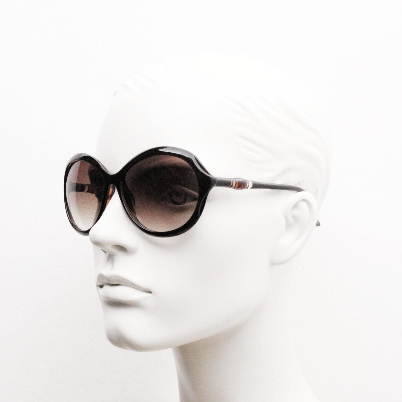 Y2K vintage big round sunglasses. Women's classical 60s design in brown gloss with graduating lenses and subtle arm detail. 2000s. 00s NOS