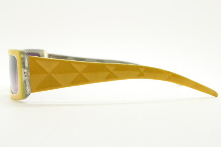 Y2K vintage rectangular shield sunglasses. Low profile canary yellow wrap around frame with quilt effect arms and ombre lenses. NOS. 2000s