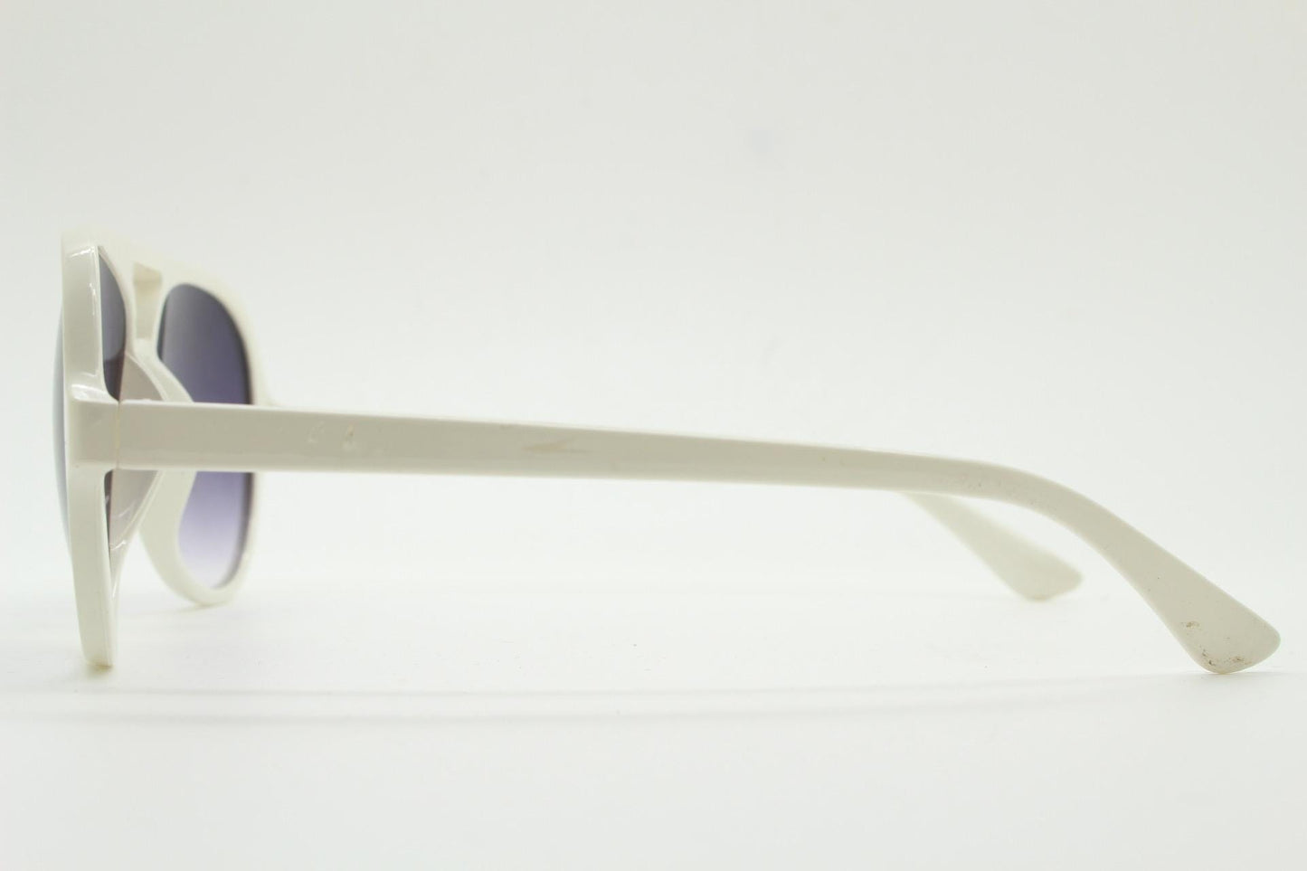 Y2K vintage teardrop aviator sunglasses. 2000's ice white frame with graduating black lenses and bridge outline. 80s design NOS aviators