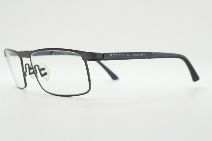Porsche design rectangular eye glasses model 8251 made in Japan. Minimal gunmetal grey wire optical frame. Prescription RX spectacles