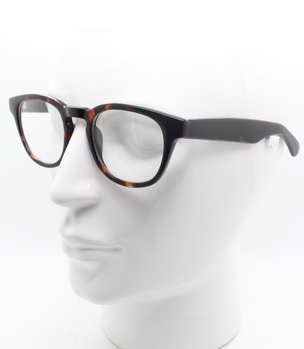 80s vintage modified wayfarer style glasses. Tortoise optical frames with keyhole bridge and clear lenses. 40s, 50s style NOS eyeglasses