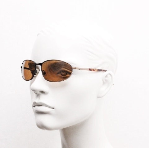 Y2K vintage small bug eye aviator sunglasses. Curved copper brushed finish solid metal frame with tortoise arms. Unused 2000s NOS