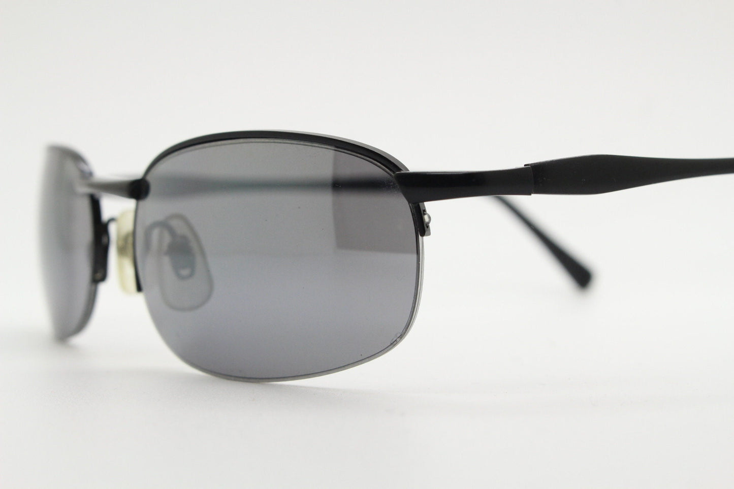 90s vintage small oval black sunglasses. Satin finish half frame with grey lenses and slight mirror glaze. 2000's. Y2K. Unused NOS