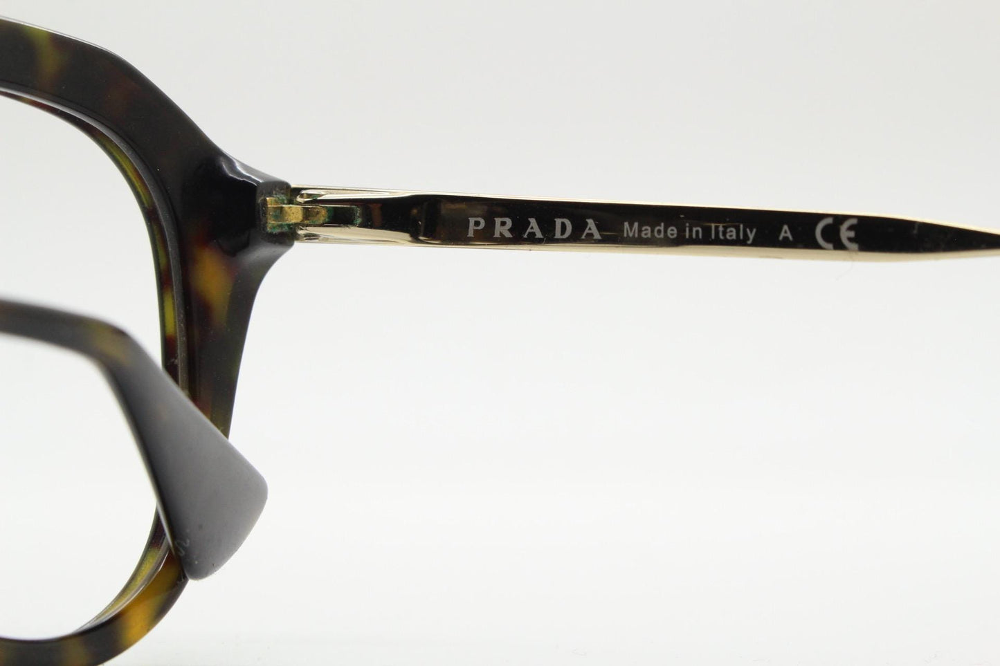 Prada angular eye glasses made in Italy. Thick tortoise acetate optical frames with prominent gold double bridge. Prescription. RX
